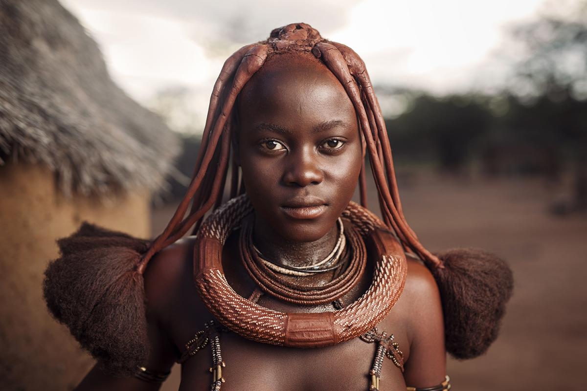 From the time a Himba girl is born, her hairstyle will identify her place in society. Photo by Sean Tucker.