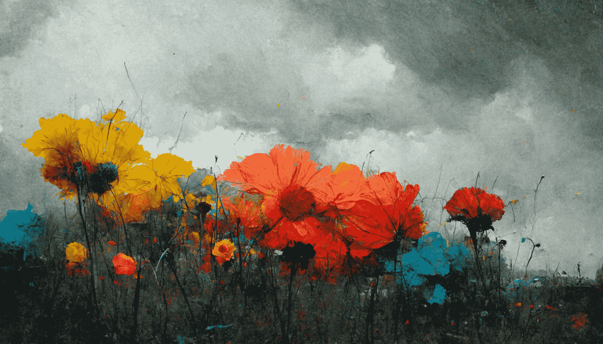 Brightly coloured flowers against a cloudy, grey sky.