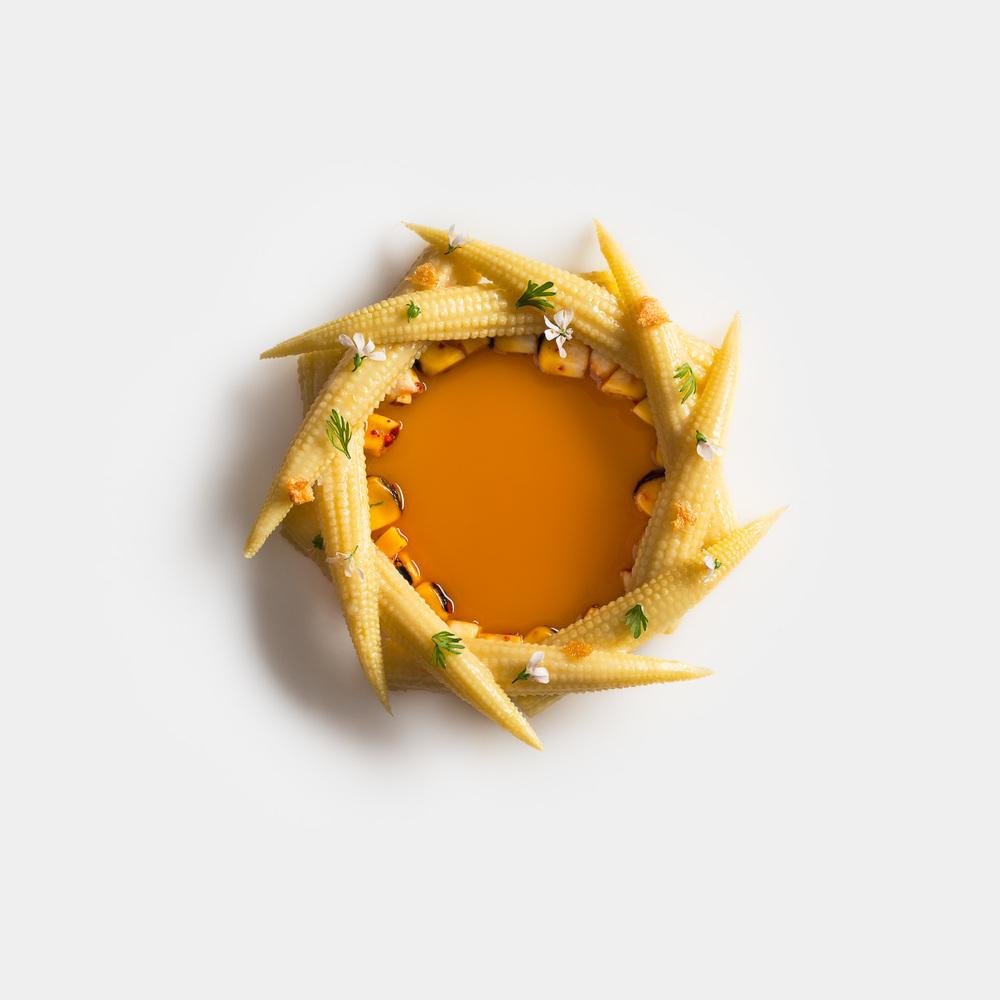 Bowl of corn with lemongrass soup by Daniel Humm at Eleven Madison Park Restaurant, NYC
